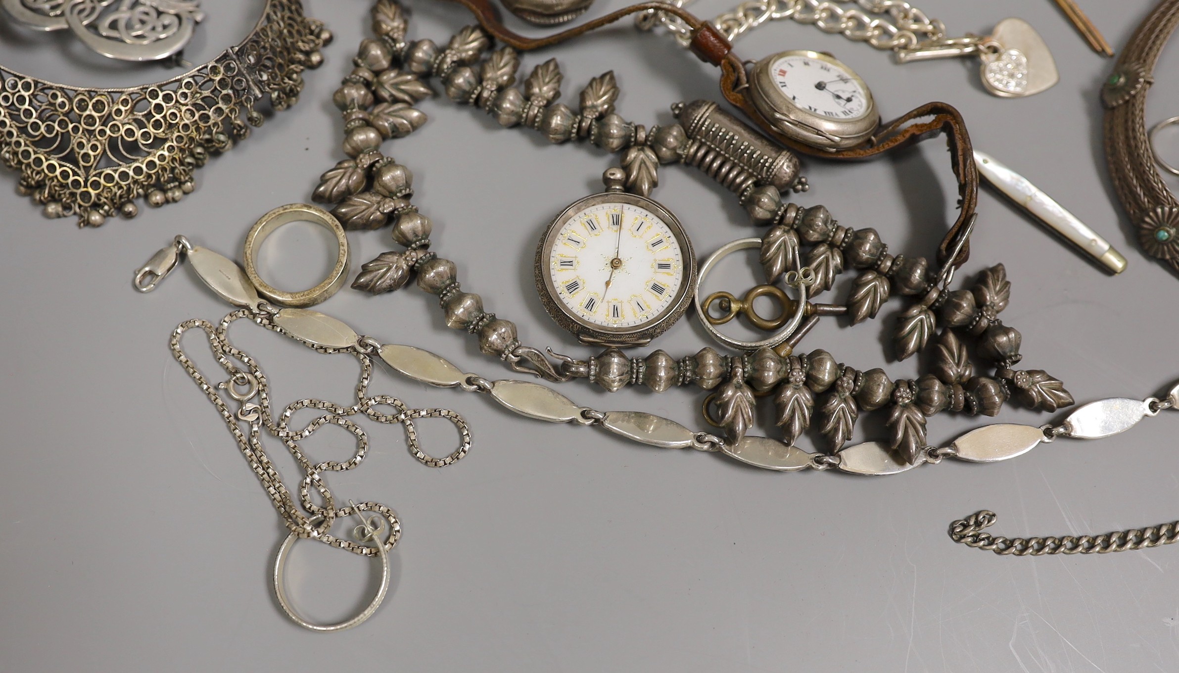 Assorted mainly silver and white metal jewellery, including vesta case, a Chinese white metal salt, a white metal propelling pencil modelled as a pig, two fob watches and a wrist watch, bracelet chains, a plated guitar b